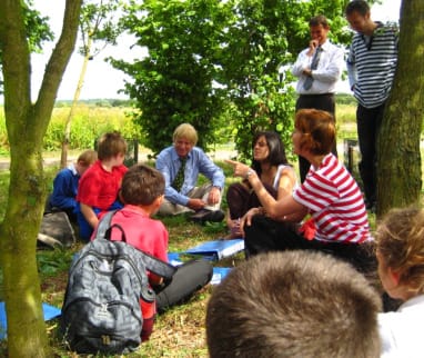Michael Fabricant joins Ridgeway Primary School youngsters in a poetry class at the National Memorial Arboretum