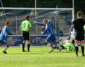 Ben Jevons celebrates making it 2-1 to Chasetown FC against Halifax Town. Pic: Dave Birt