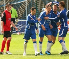 Grant Ryan is congratulated by his Chasetown FC team-mates. Pic: Dave Birt