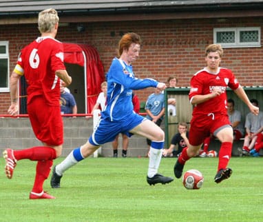 Lee Smith breaks through the Quorn defence. Pic: Dave Birt