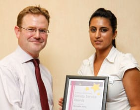 003-5-Spring Shamylla Sadiq receives her award from David Grady