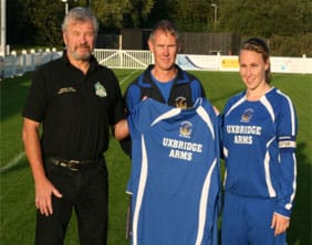 Tim Jones presents the new kit to Nicci Barter