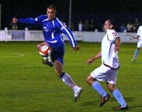 close-control-from-gary-birch Chasetown's Gary Birch takes the ball away from his marker. Pic: Dave Birt