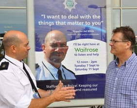Inspector Jed White chats with a shopper