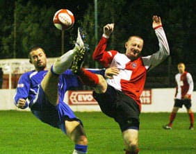 Chasetown's new signing David Bridgewater wins the ball. Pic: Dave Birt