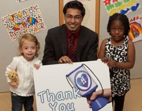 Logo challenge winner Muhammed Shehzad patients Chloe Clark and Kim Matoro