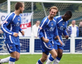 Dave Egan celebrates after making it 5-0 to Chasetown against Burscough. Pic: Dave Birt