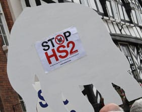 A Stop HS2 placard in the shape of a white elephant