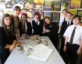 Artist Kate Tilley with pupils from Nether Stowe School
