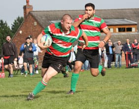 Burntwood's Rob Cartwright makes a dash for the line. Pic: Joanne Gough