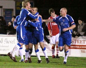 Chasetown FC players celebrate after scoring against Workington. Pic: Dave Birt