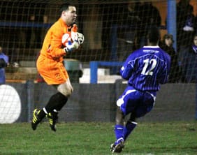 Chasetown goalkeeper Darren Acton claims the ball. Pic: Dave Birt