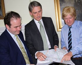 hs2hammondpincherfabricant Chris Pincher, Philip Hammond and Michael Fabricant examine a map of the HS2 route