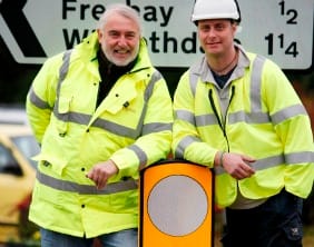 Cllr Mike Maryon and engineer Andy Boote with one of the illuminated bollards
