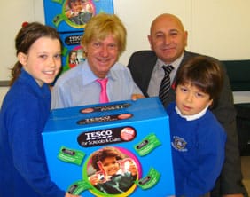 Tesco-Schools-St-Chads-12.11.10 Michael Fabricant MP and John Sheward present equipment to pupils from St Chad's