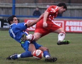 Danny Smith's run is halted by a good tackle. Pic: Dave Birt
