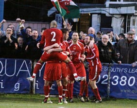 celebration-time-with-the-blue-army Celebration time for Chasetown's players and supporters after their win at Eastleigh. Pic: Dave Birt