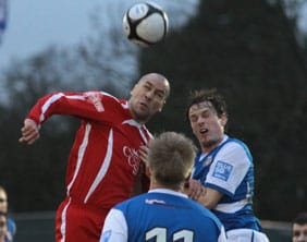 Gary Hay wins the ball in the air. Pic: Dave Birt