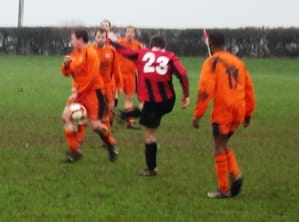 Pete Burton strikes at goal