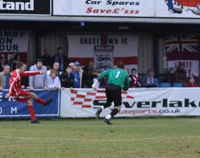 Richard Davies slots home to make it 1-0 to Chasetown. Pic: Dave Birt
