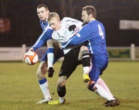 Chasetown's Richard Davies and Chris Slater battle for the ball. Pic: Dave Birt