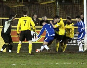 Steve Abbott bundles the ball home for Chasetown. Pic: Dave Birt