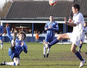 Adam Westwood clears the ball. Pic: Dave Birt