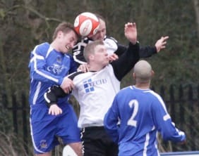 Ben Jevons wins the ball in the air. Pic: Dave Birt