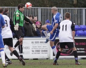Gary Hay lobs the Frickley keeper. Pic: Dave Birt