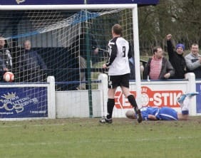 Gary Hay's lob drops into the net. Pic: Dave Birt