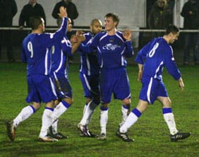 Ben Jevons celebrates with his Chasetown team-mates. Pic: Dave Birt