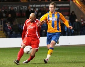Jimmy Turner clears the ball. Pic: Dave Birt