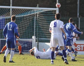 Kevin Burgess levels for Whitby with an overhead kick. Pic: Dave Birt