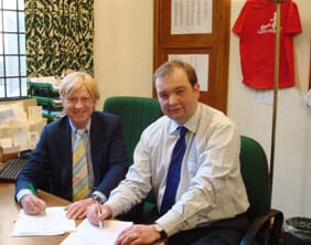 Michael Fabricant MP and James Duddridge MP sign the budget documents with the Viva LichVegas t-shirt in the background