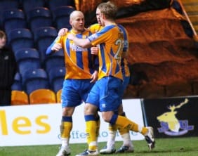 Adam Murray celebrates his goal for Mansfield Town. Pic: Dave Birt