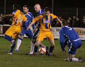 Chasetown defend in numbers against Mansfield Town. Pic: Dave Birt