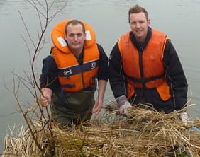 Rich-Edwards-and-Rob-Taylor-v1 Rich Edwards and Rob Taylor working on one of the floating islands