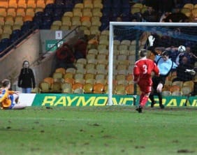Danny Mitchley makes the win secure for Mansfield Town. Pic: Dave Birt