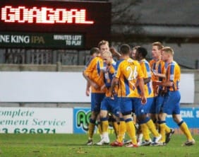 Mansfield Town's players celebrate. Pic: Dave Birt