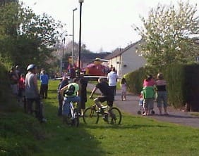 airambulance Residents look on as the Air Ambulance lands inside the police cordon