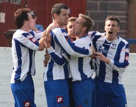 Grant Darley celebrates netting Frickley's equaliser. Pic: Dave Birt
