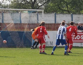 Grant Darley's strike finds the Chasetown net. Pic: Dave Birt