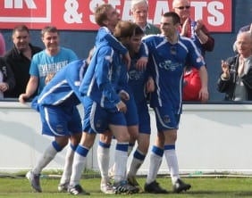 Chasetown's players celebrate Mark Branch's goal. Pic: Dave Birt