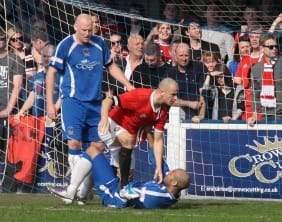 FC United skipper Mike Norton tangles with Jimmy Turner, earning himself a red card in the process. Pic: Dave Birt