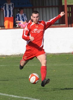 Richard Davies plays the ball. Pic: Dave Birt