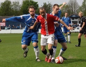 Chris Slater and Richard Davies try to win the ball for Chasetown. Pic: Dave Birt