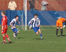Jack Watts celebrates the Frickley Athletic winner. Pic: Dave Birt