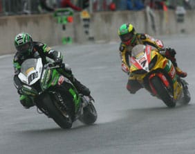 Gary Mason (left) leads the way in the rain