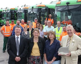 Andrew Barratt, Ruth Plant, Cllr Louise Flowith and Cllr John Garner surrounded by members of the recycling team