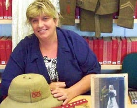 Debra Harris with some of the donated items